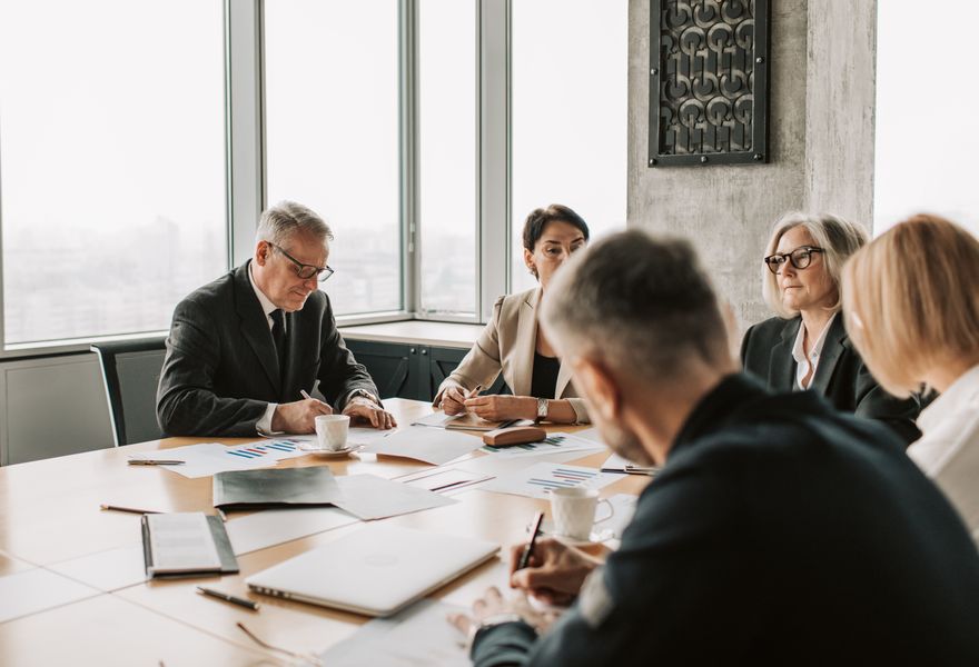 Executives in a boardroom strategy meeting